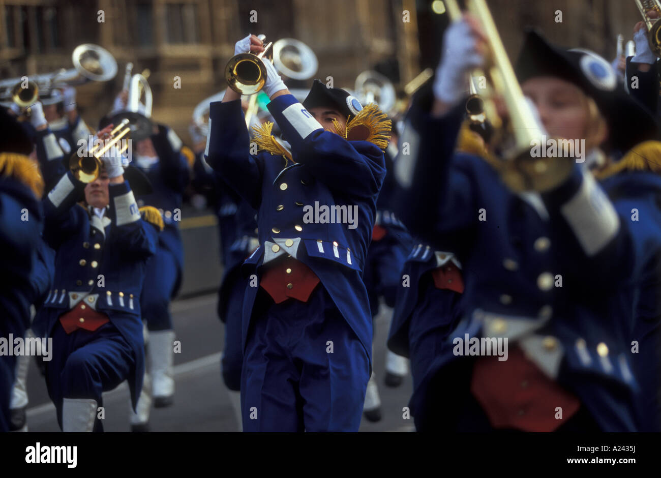 American musicians waving their instruments over the top of their heads ...