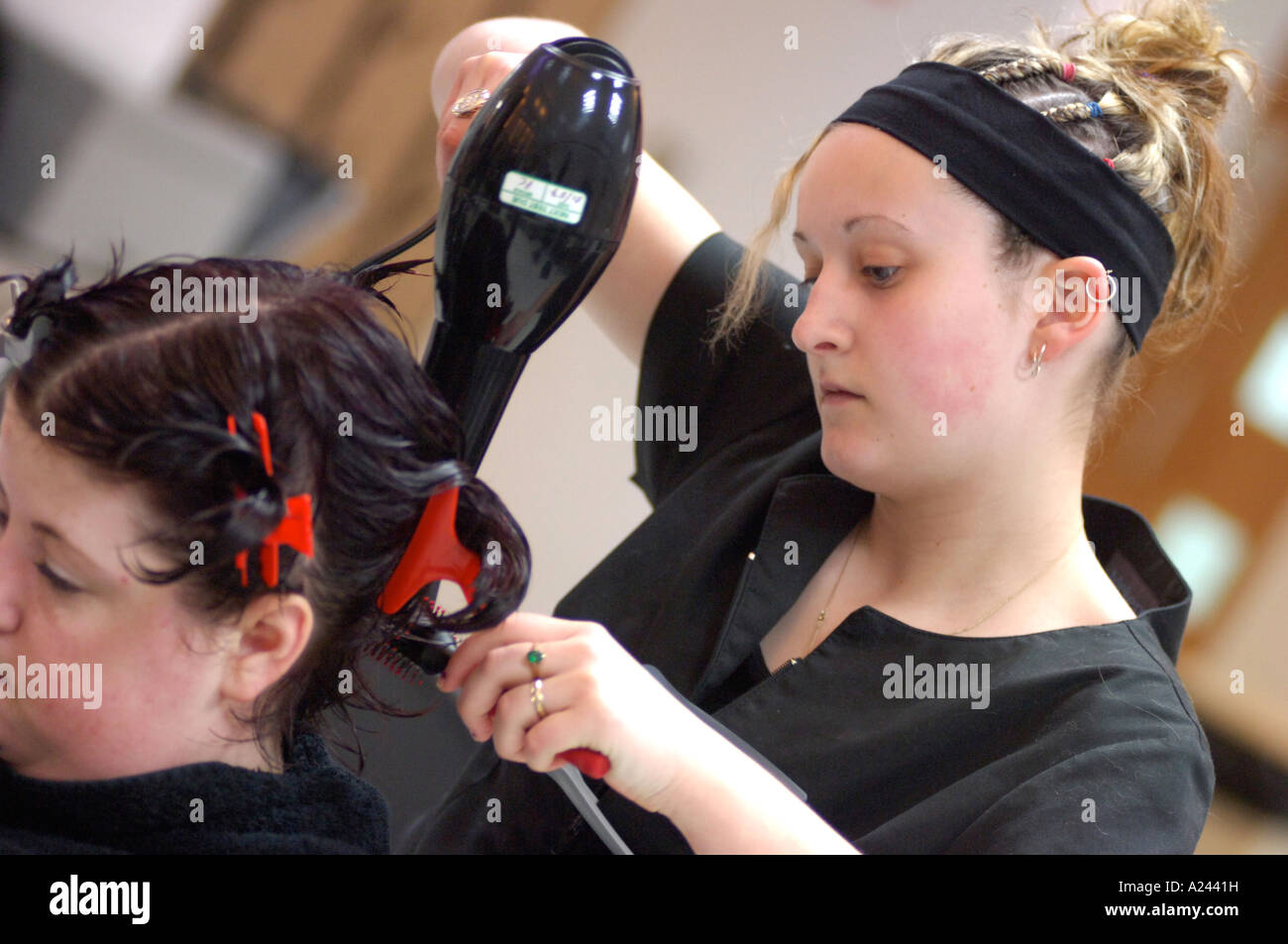 British young female teacher student beauty treatment hairdressing