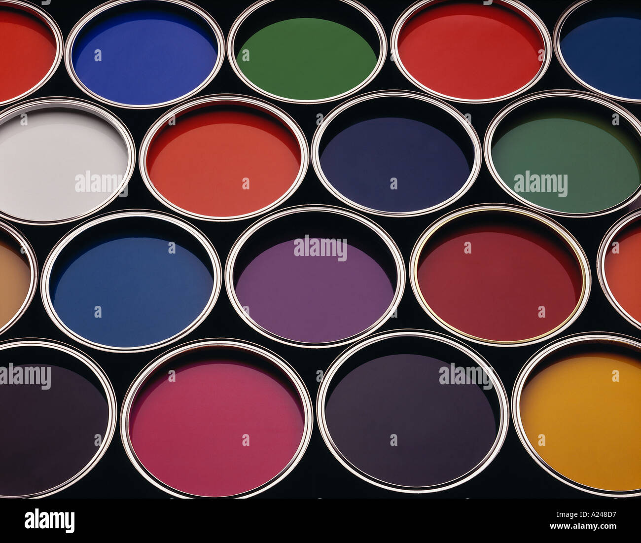 CANS OF COLOURED PAINT Stock Photo