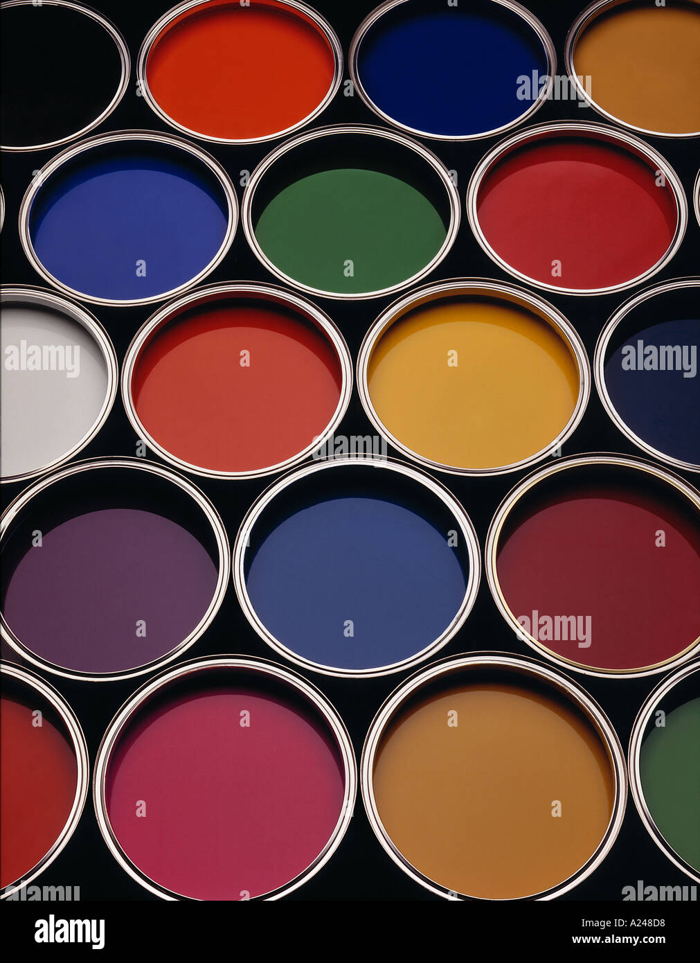 CANS OF COLOURED PAINT Stock Photo