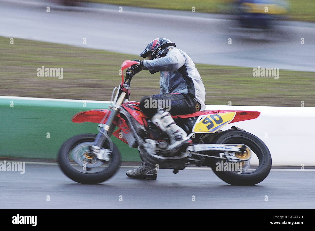 Supermoto rider racing at the Mallory Park Plum Pudding races, Boxing day 2005 Stock Photo