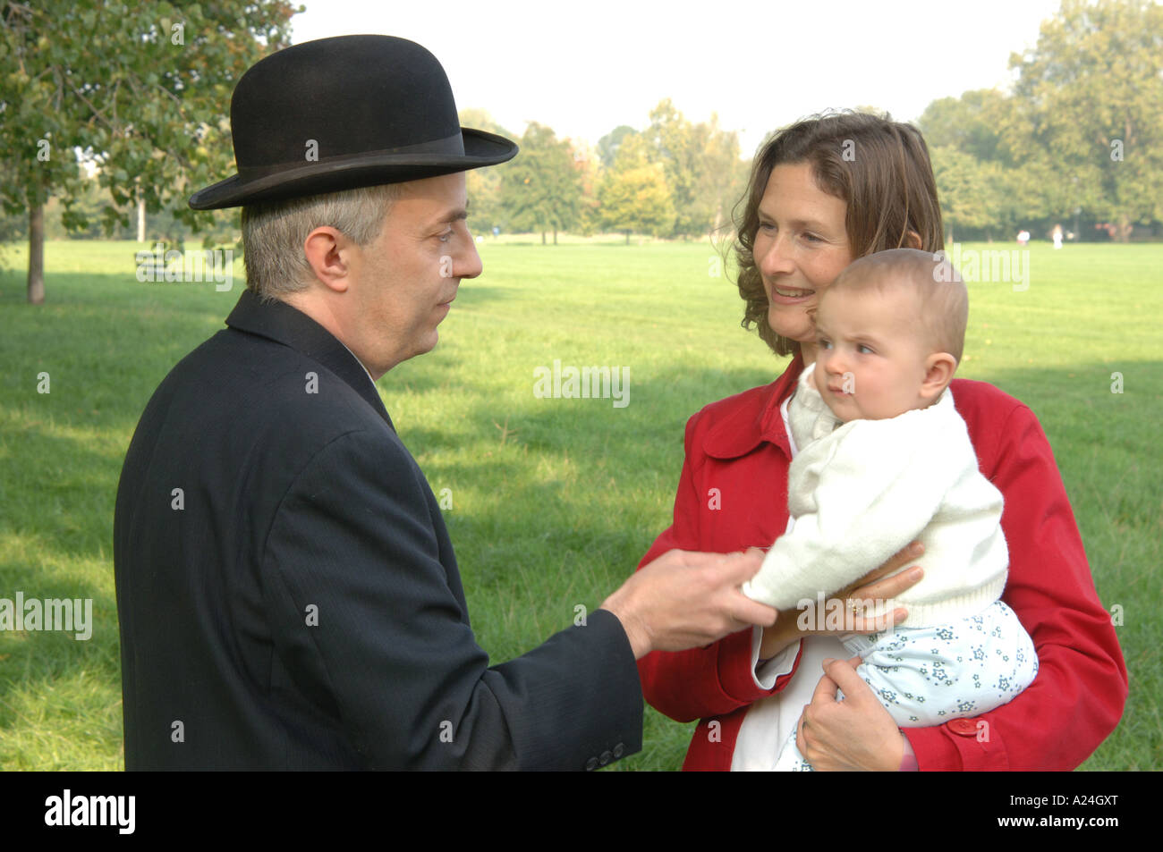 city gent with baby Stock Photo