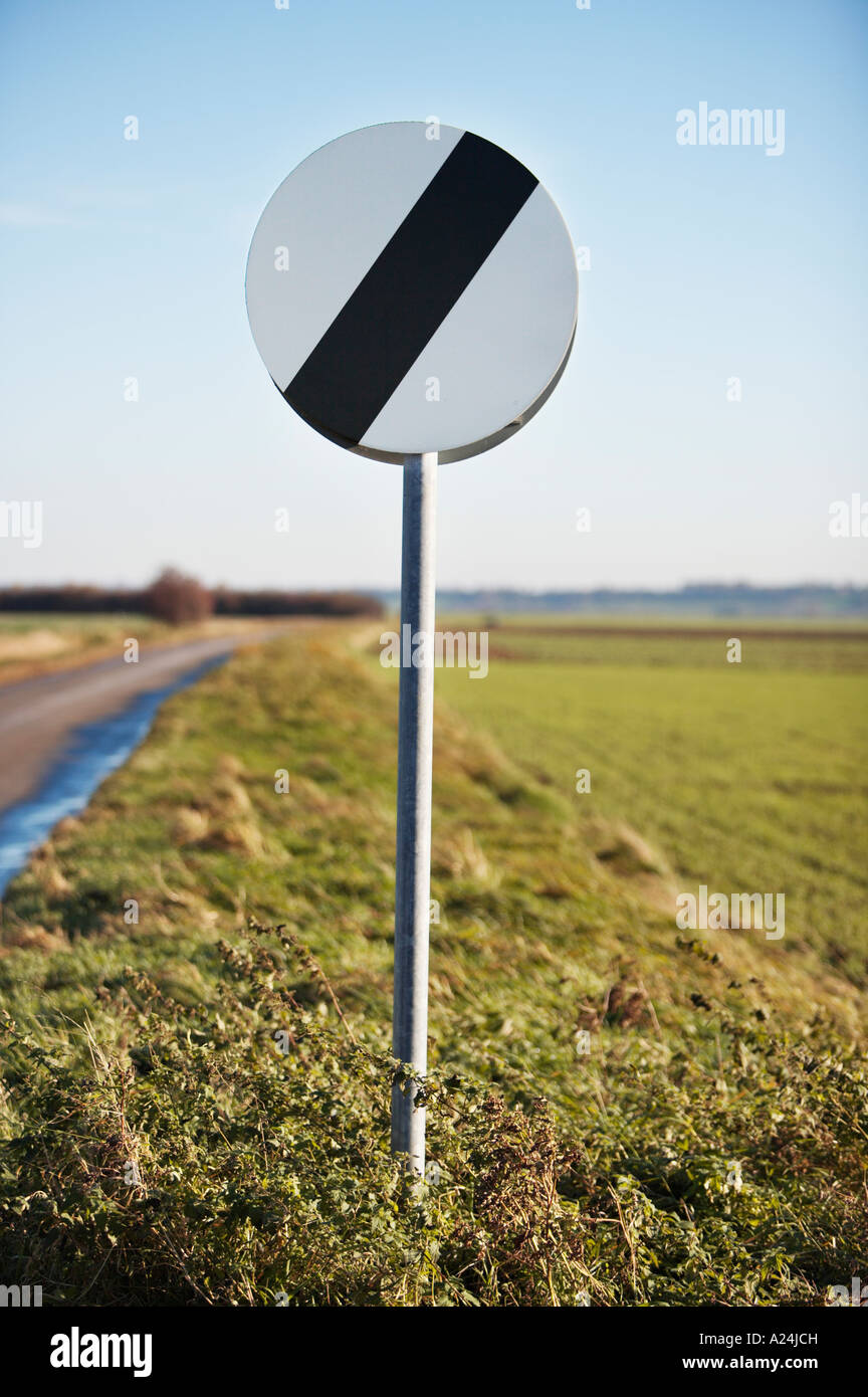 National speed limit traffic sign UK on open countryside road, England Stock Photo