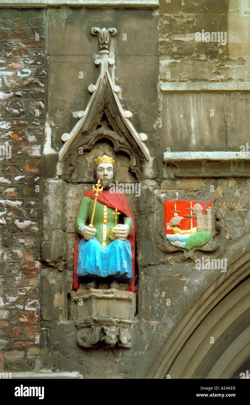 Figure of Brennus one of the legendary founders of Bristol and the city arms on the gateway under St John The Baptist's Church. Stock Photo