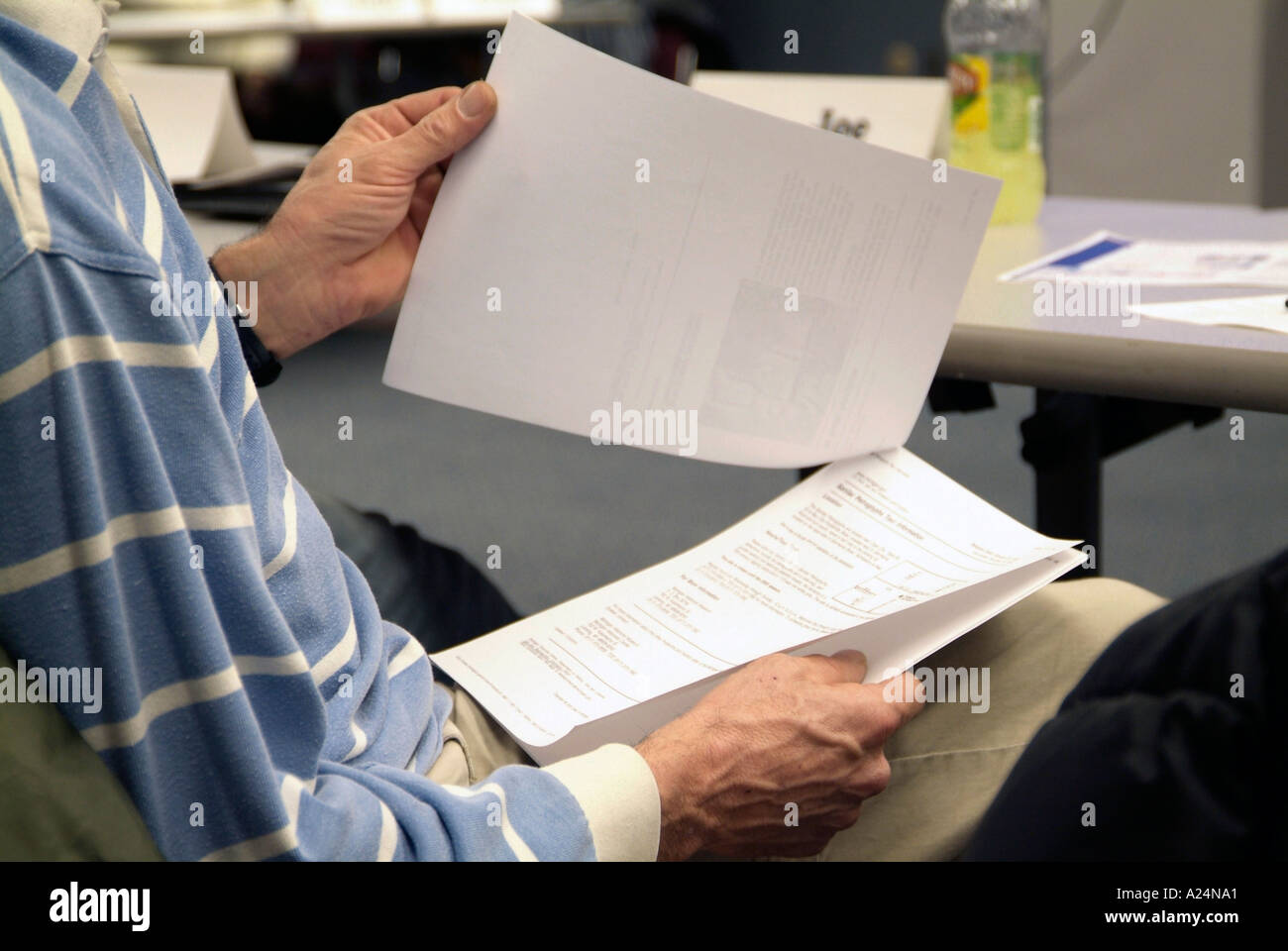 Adult computer class training is conducted during a business meeting ...