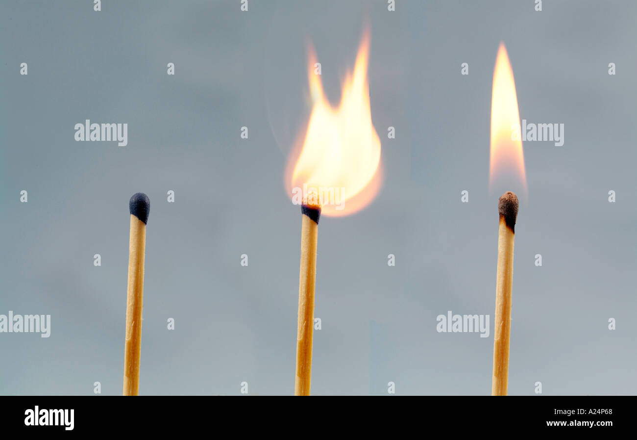 Flame burning burns after igniting a match Stock Photo