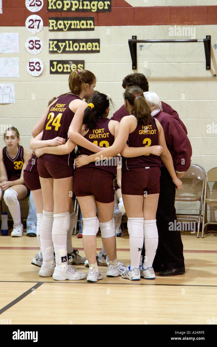 Coach Encourages Middle School Girls Volleyball Team During A Time Out Stock Photo Alamy