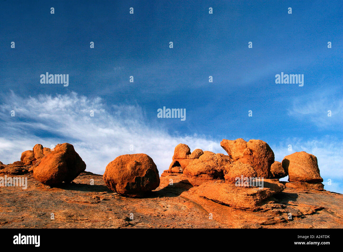 rock bowls made of red granite in Augrabis Falls National Park South Africa Stock Photo