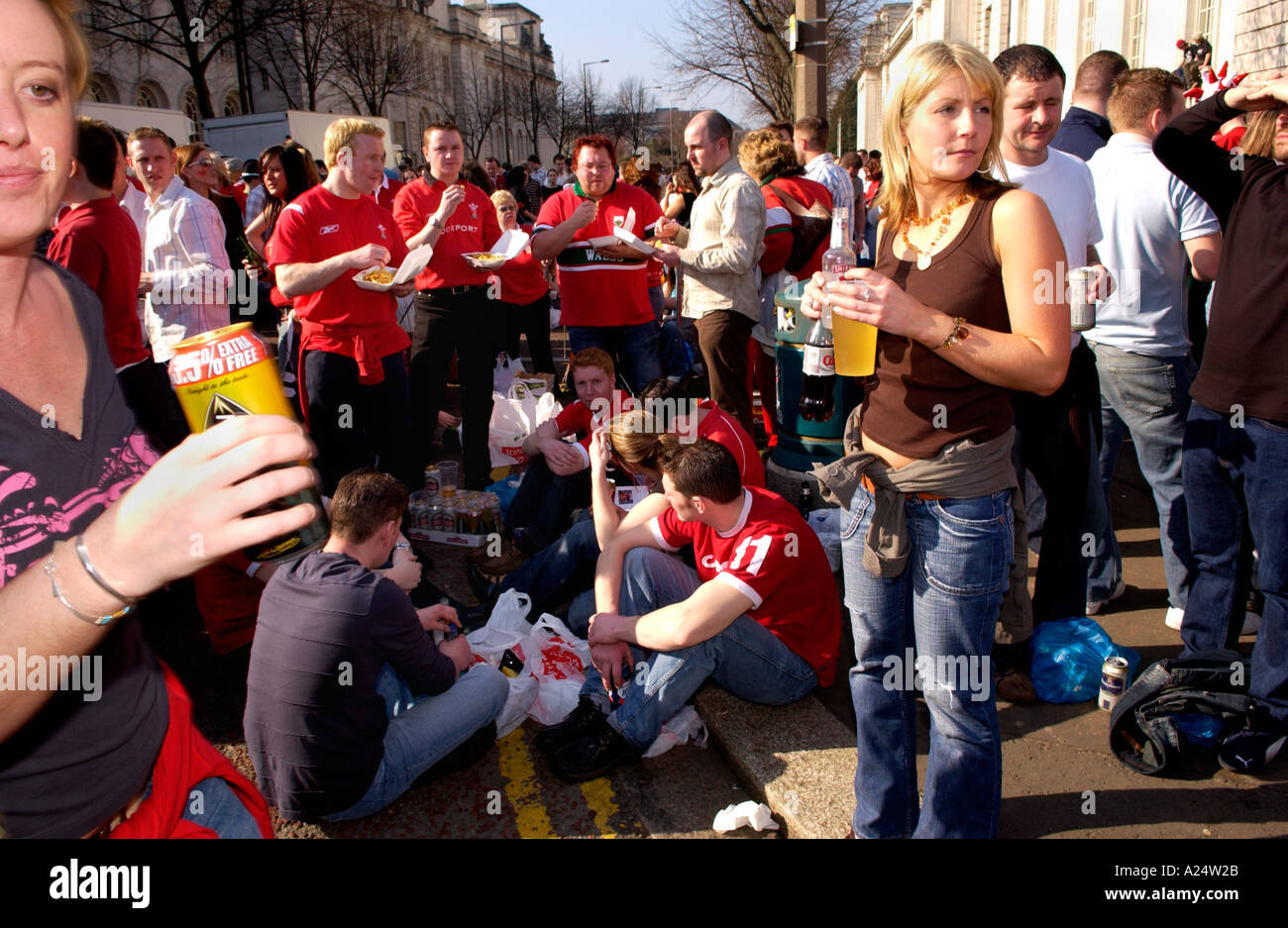 Welsh rugby fans drinking on the streets in Cardiff before a Wales international match Stock Photo