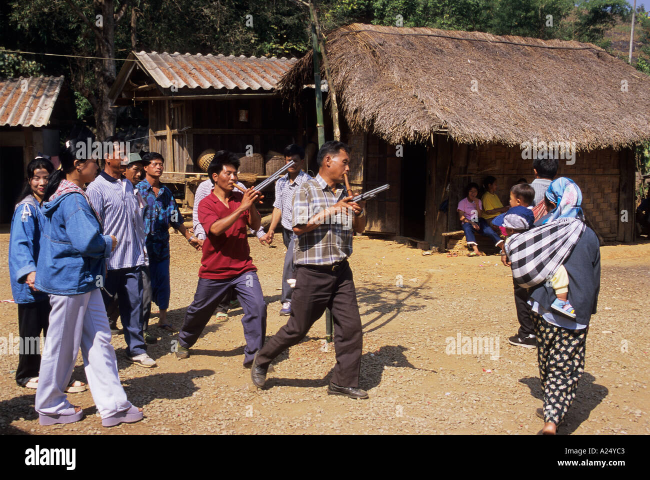 Man from the Lahu people, hill tribe, ethnic minority, carrying bamboo  poles, Mae Hong Song Province, Northern Thailand Stock Photo - Alamy