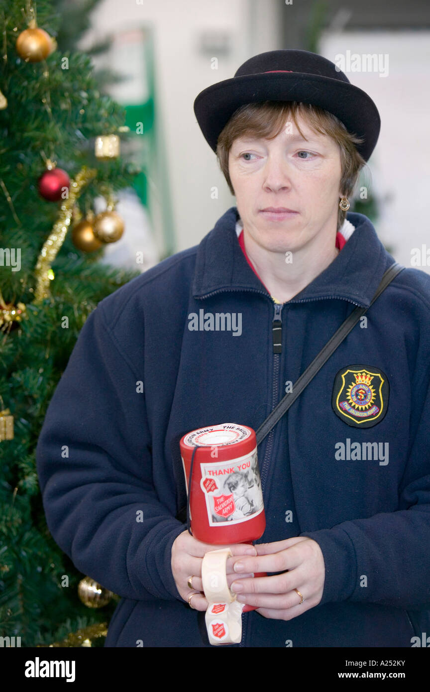 Salvation Army member collecting charitable donations, Kendal, Cumbria