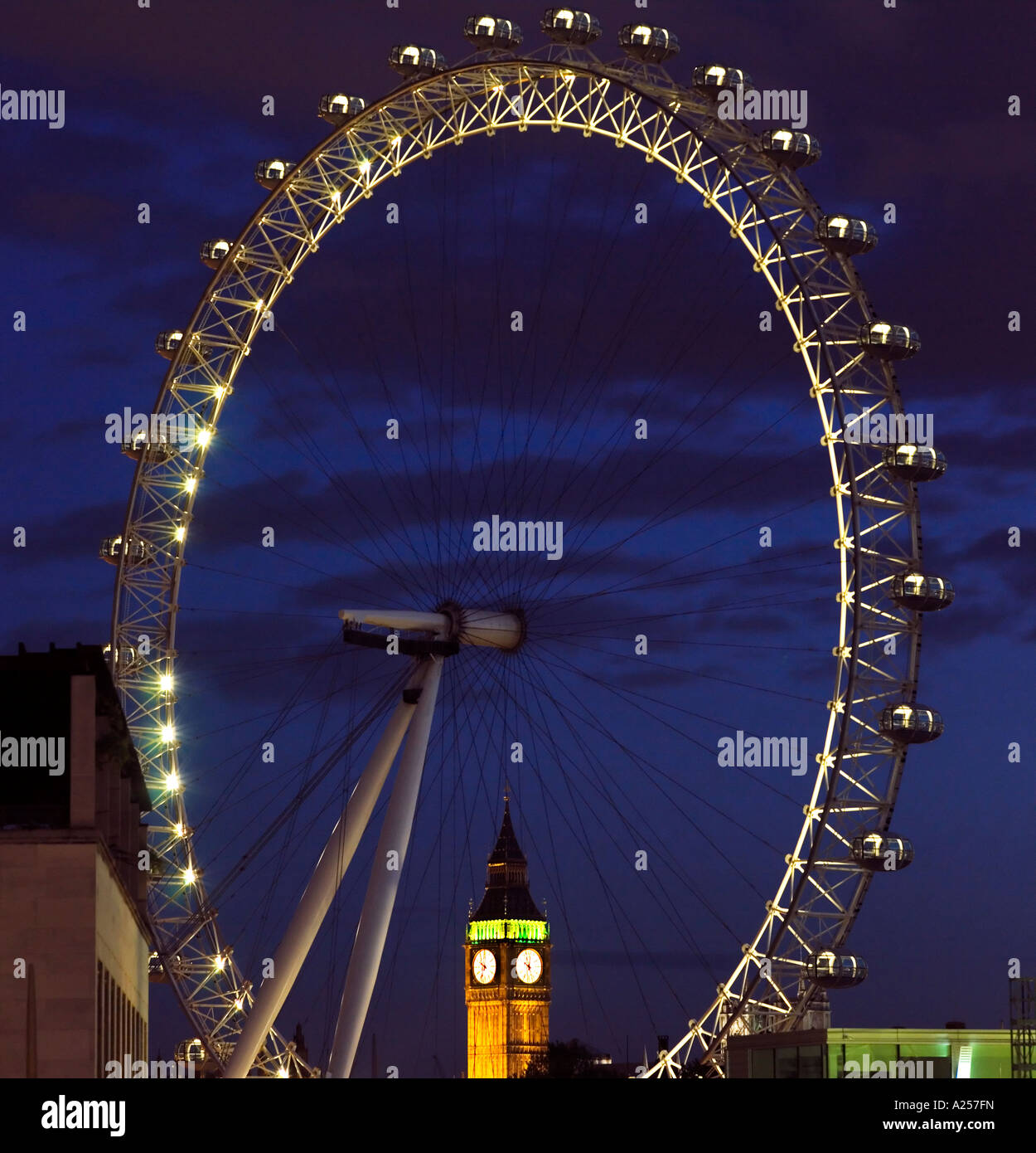 London Eye Millennium Wheel at night with Big Ben in the Background 2007 Stock Photo