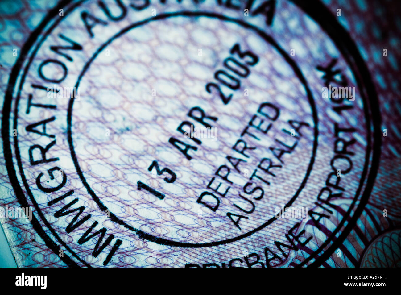 Immigration stamp in a British passport Stock Photo