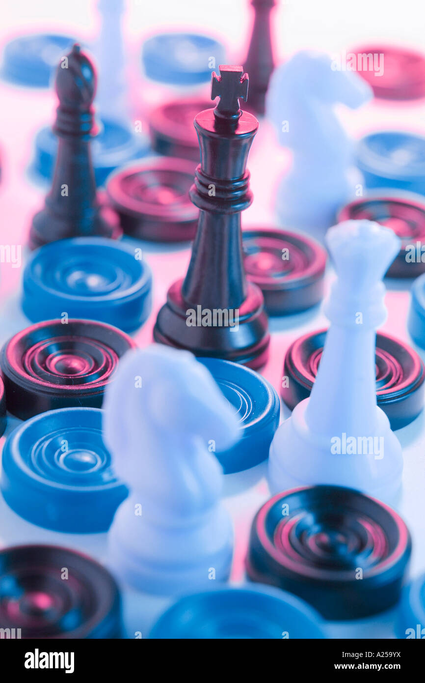 Checkers and Chess Pieces Stock Photo - Alamy