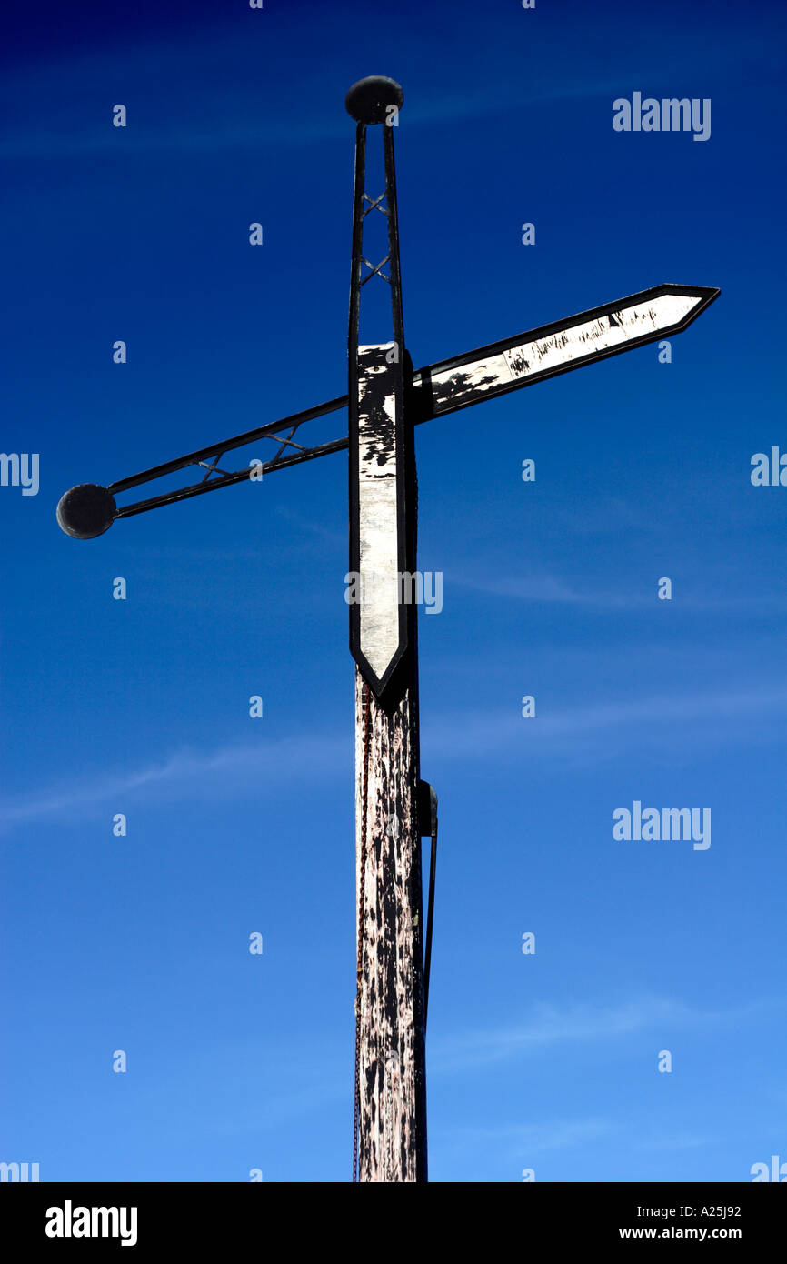 Vintage signal post against blue sky South Africa Stock Photo