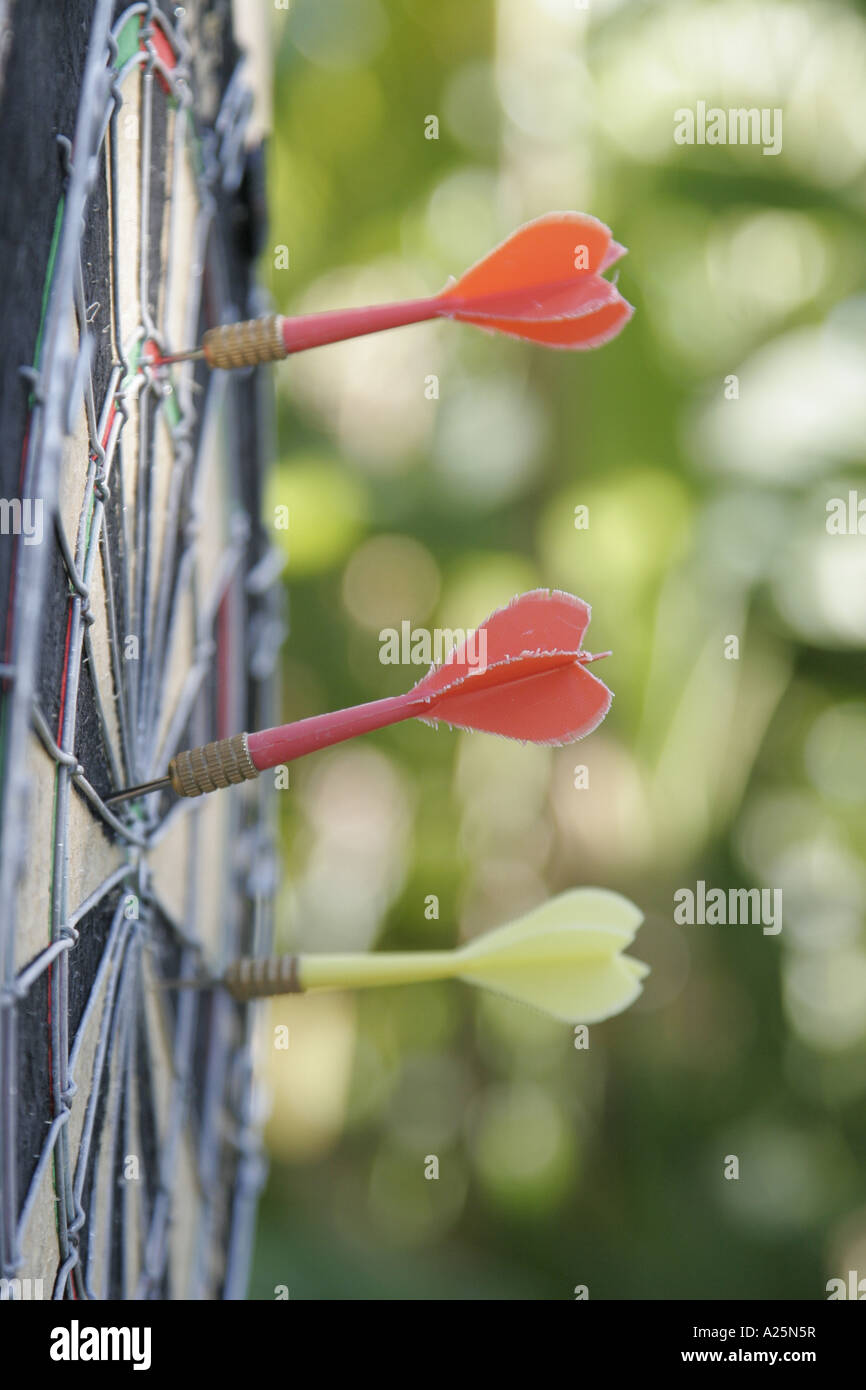 three darts in a dartdisc Stock Photo Alamy