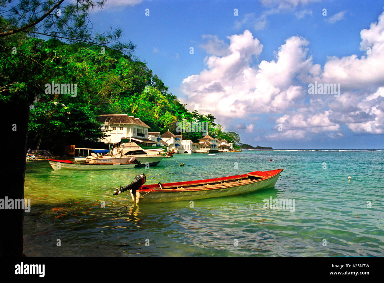 blue lagoon with red fishing boat jamaica caribbean boat lagoon blue famous tourist film
