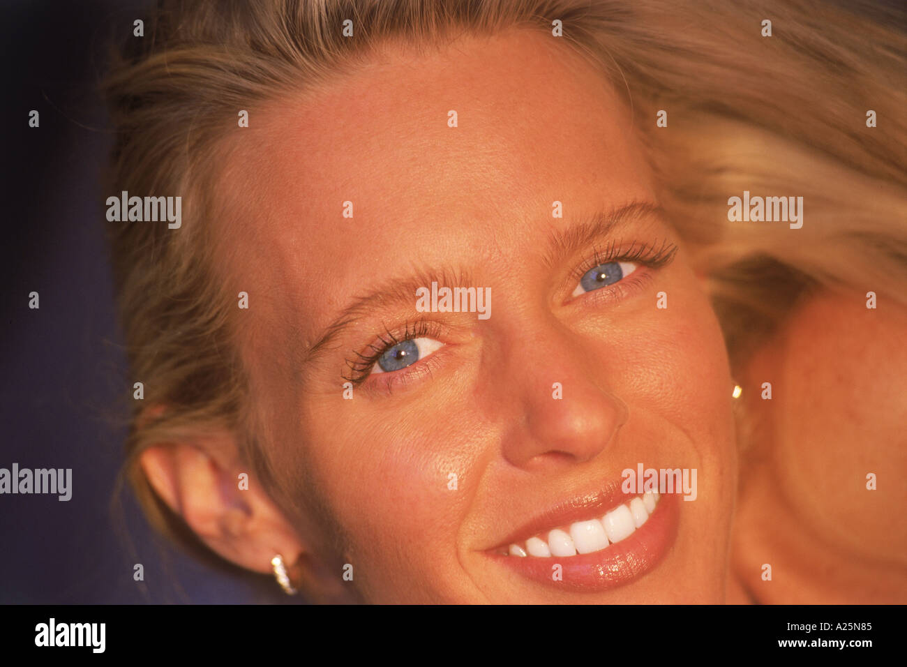 Portrait of woman with beautiful blue eyes Stock Photo