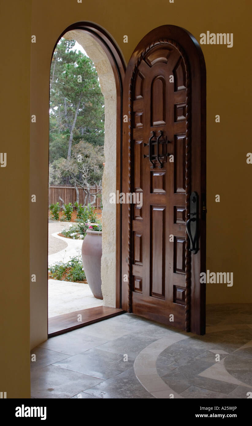 Oval shaped hand made wooden DOOR from Mexico CALIFORNIA LUXURY HOME Stock  Photo - Alamy