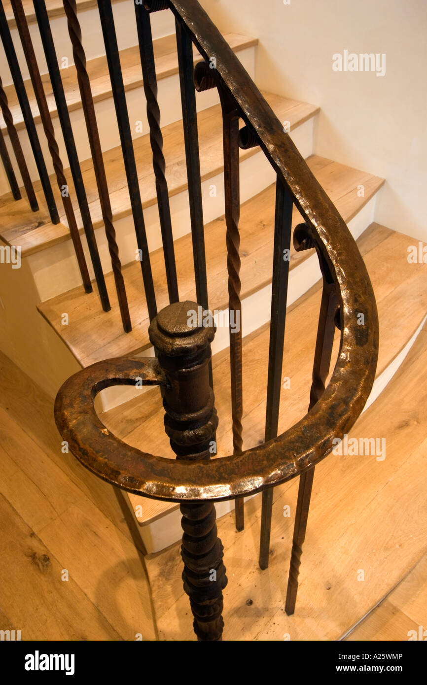 STAIRWAY made of hardwood and circular wrought iron railing CALIFORNIA ...