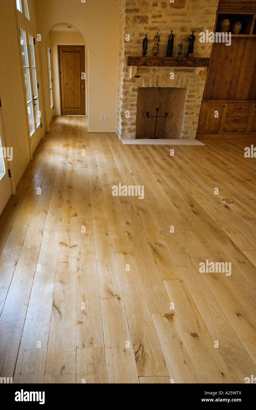 Hard Wood Floor And Stone Fireplace In Living Room California