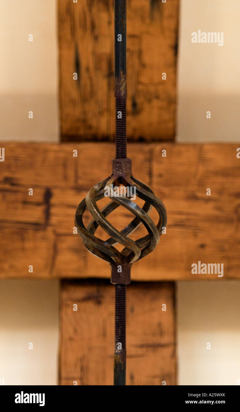A Wrought Iron Turnbuckle And Open Beam Ceiling In A California