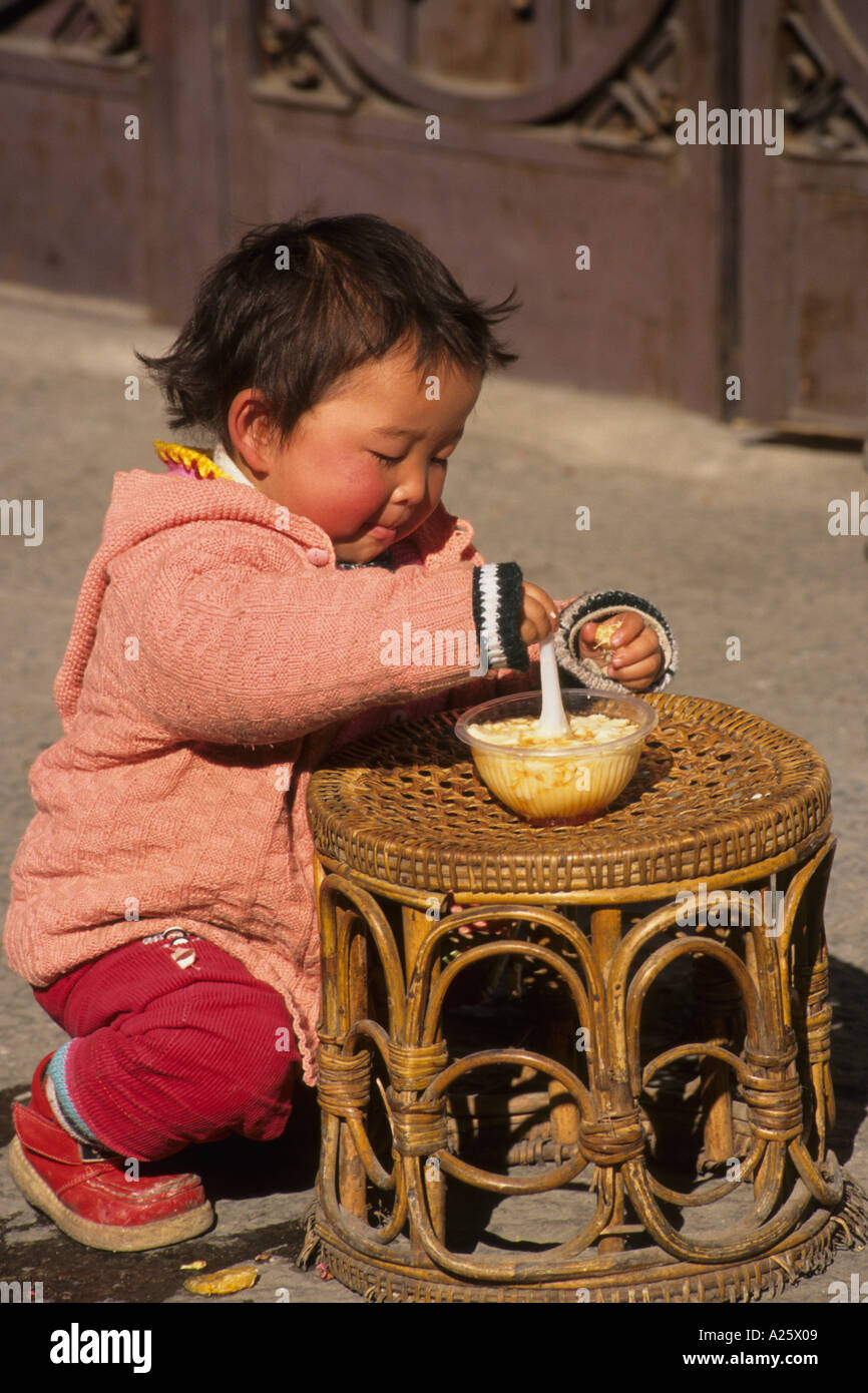 Children eating china hi-res stock photography and images - Alamy
