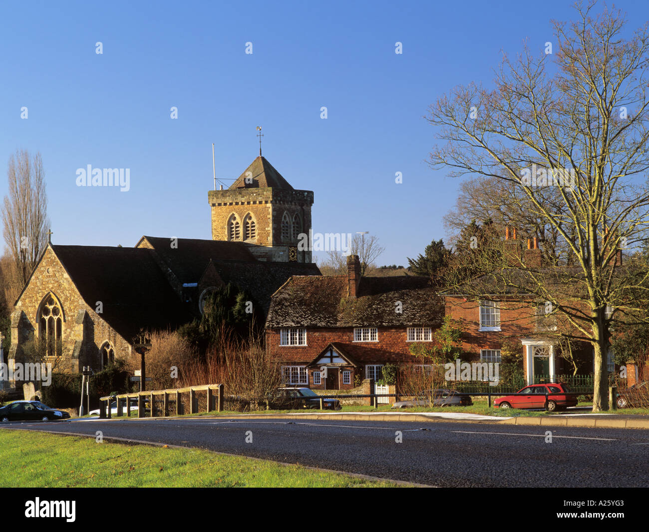 ST MARY'S CHURCH and COTTAGES Chiddingfold Surrey England UK Europe Stock Photo