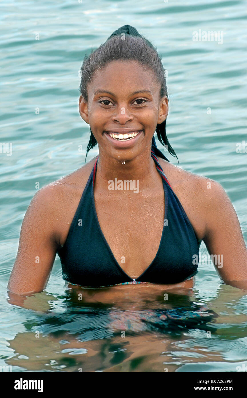 Black female teenager in swimsuit hi-res stock photography and