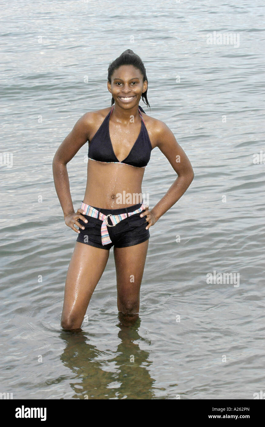 Fit african girl in swimsuit hi-res stock photography and images - Alamy