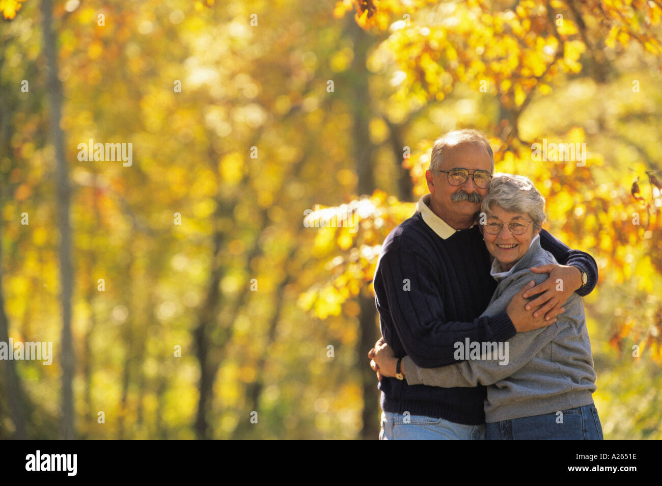 Couples holding each other hi-res stock photography and images - Alamy
