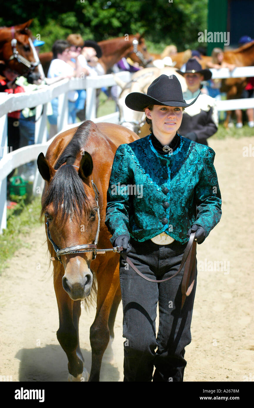 High school age female students compete in equestrian events Stock
