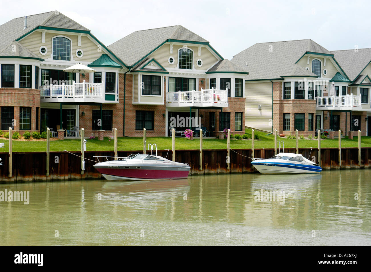 New condominium housing units with boats used as transportation Stock ... - Condominium Communities With Private Transportation Services