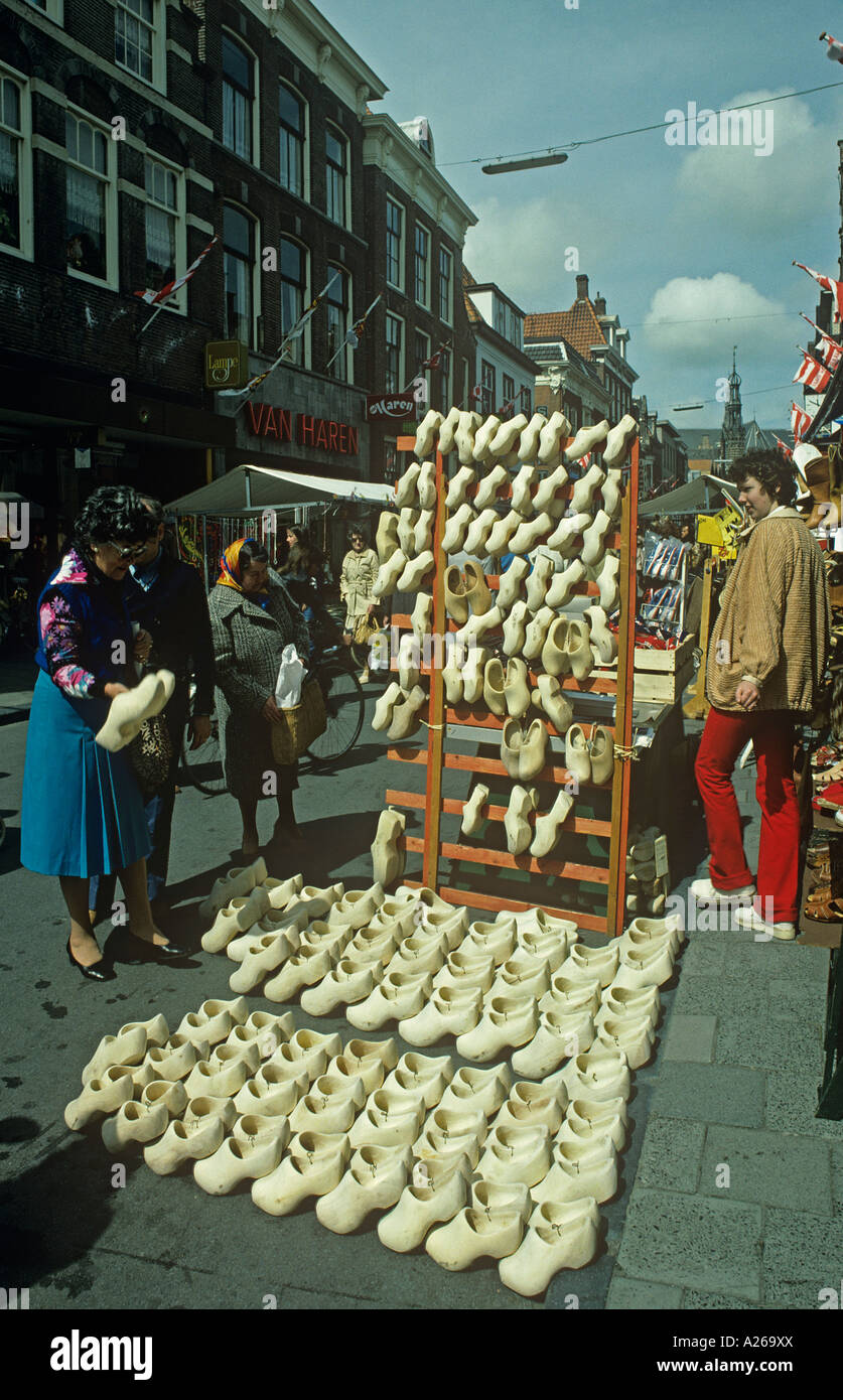 Clog Stall display of unfarnished wooden clogs on street stall in the town of Alkmaar North Holland Stock Photo