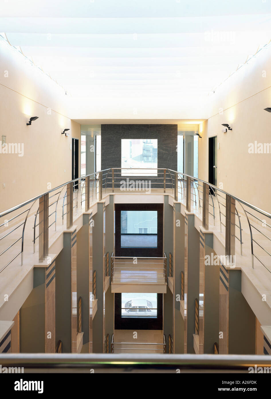 View of a corridor with a metallic railing Stock Photo - Alamy