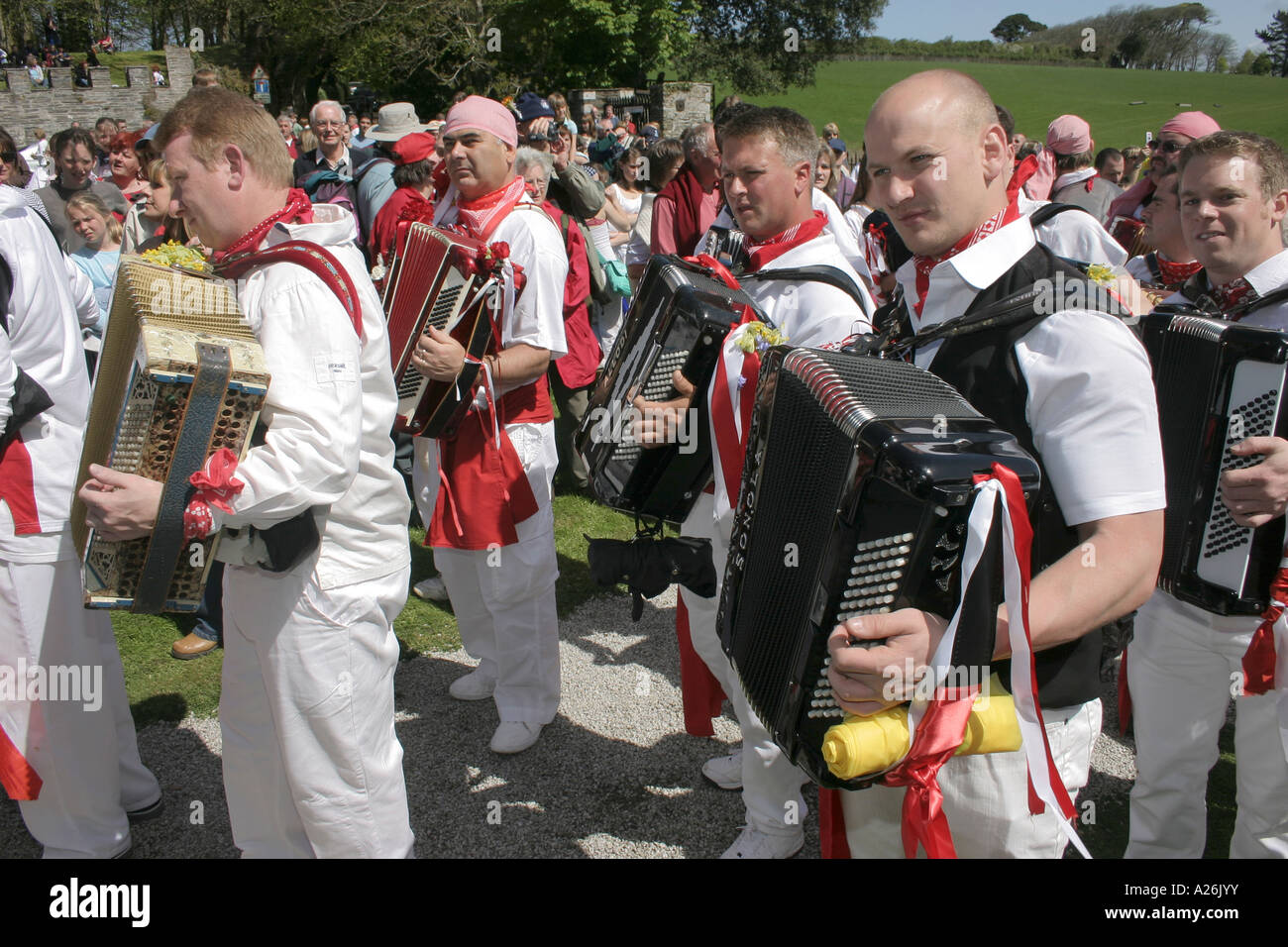 Musicians following the Padstow Obby Oss outside Prideaux Place during the traditional May Day celebrations Stock Photo