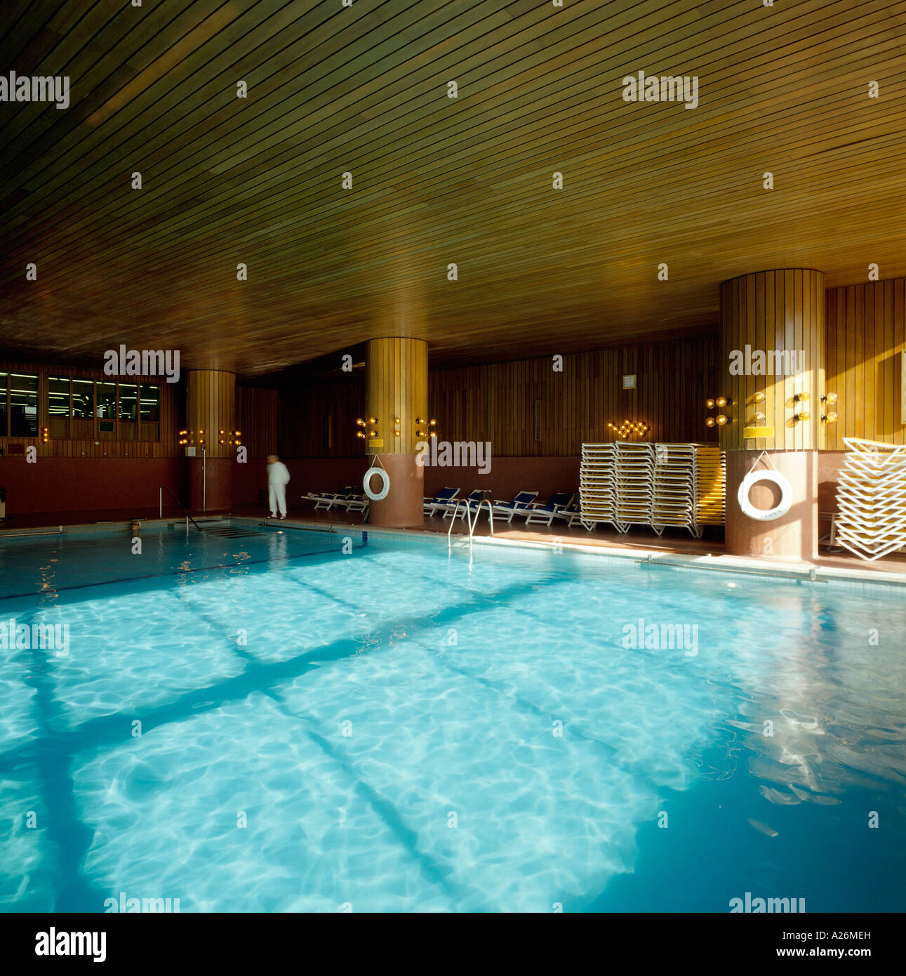 View of an interior swimming pool with a wooden ceiling Stock Photo - Alamy