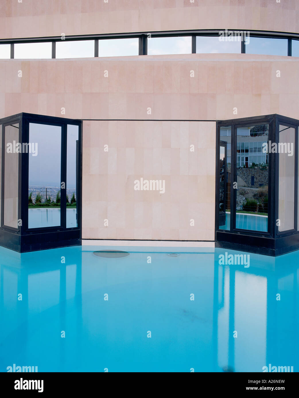 View of a swimming pool in front of a house Stock Photo - Alamy