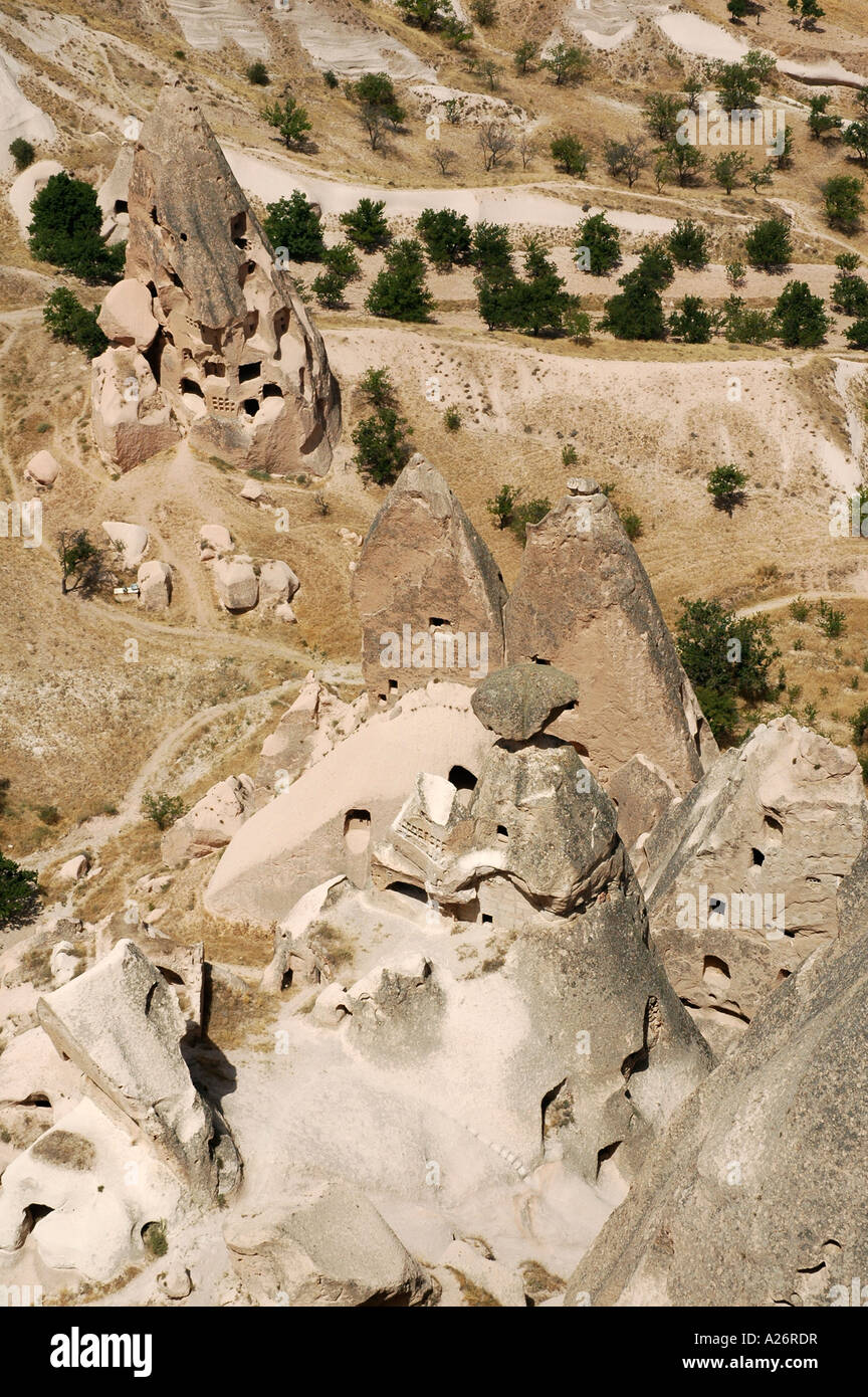 Old troglodytic cave dwellings cut into the rock Castle, Uchisar, Cappadocia, Anatolia, Turkey, Asia Stock Photo