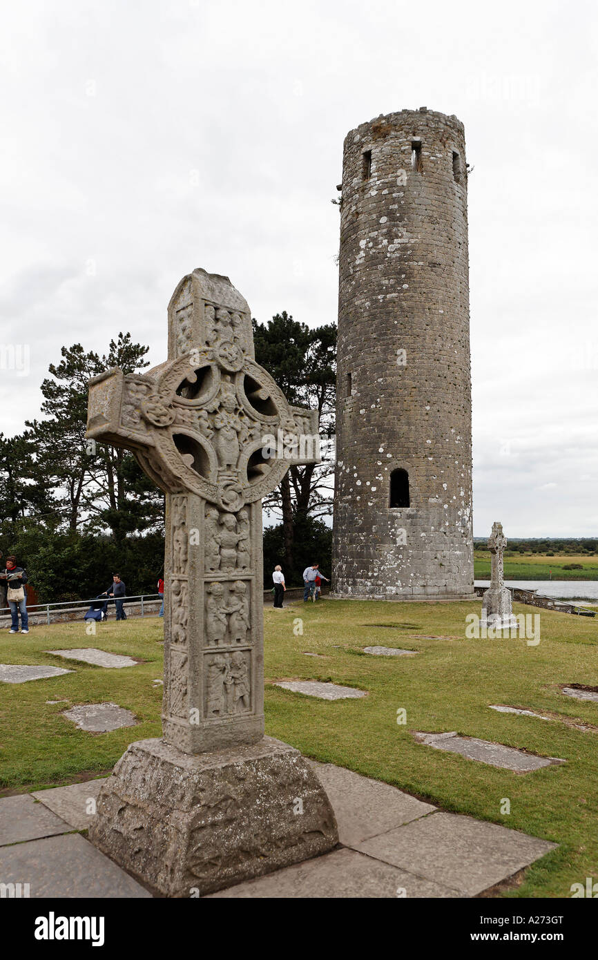 The southcross a celtic cross (copy) and roundtower in the area of the abbey of Clonmacnoise, Offaly, Ireland Stock Photo