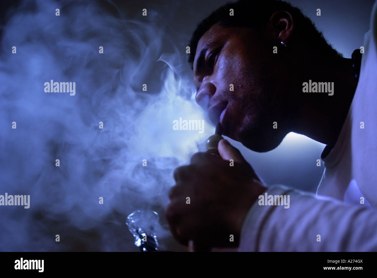 Black man smoking a hookah, Rio de Janeiro, Brazil Stock Photo Alamy