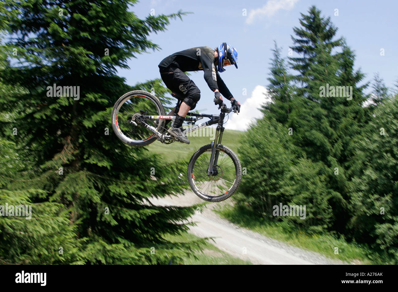 Jumping on a mountain bike Stock Photo Alamy