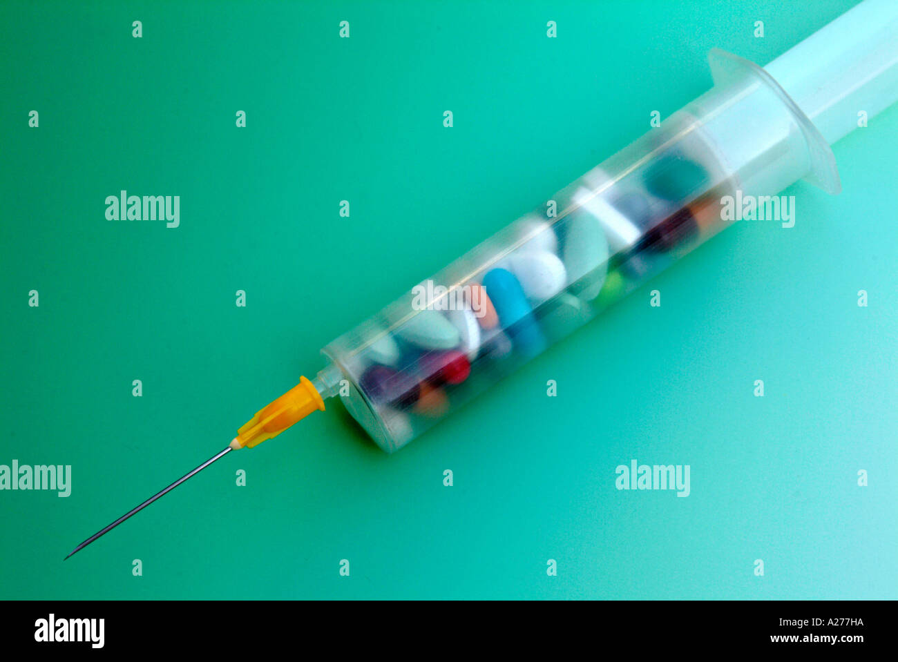 syringe filled with pills Stock Photo Alamy