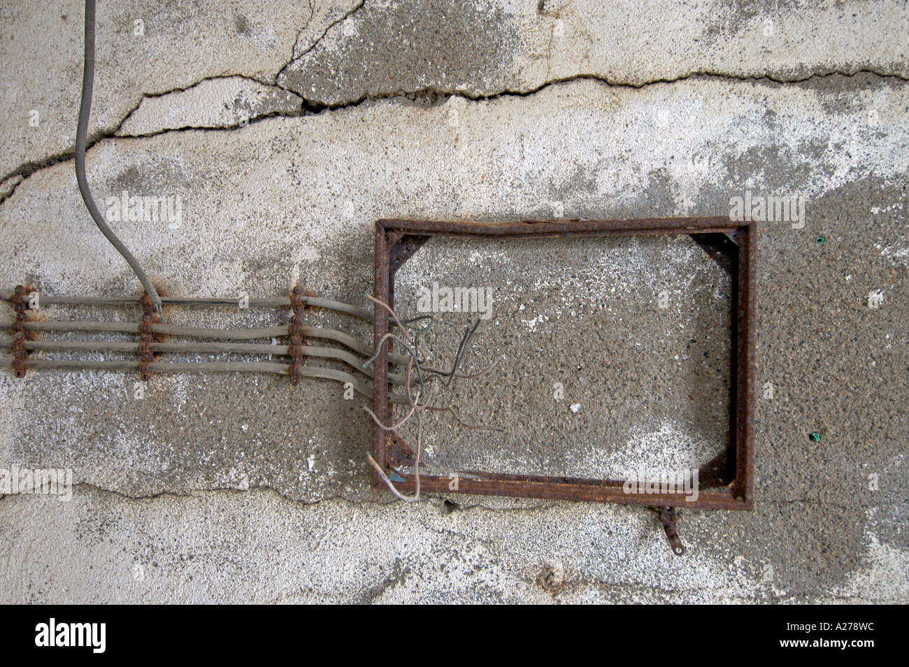 old power supply lines cables on cracked wall Stock Photo Alamy