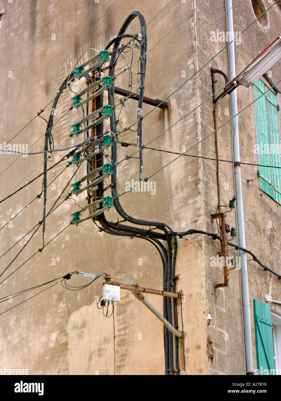 electrical installations power supply lines on facade storefront of an