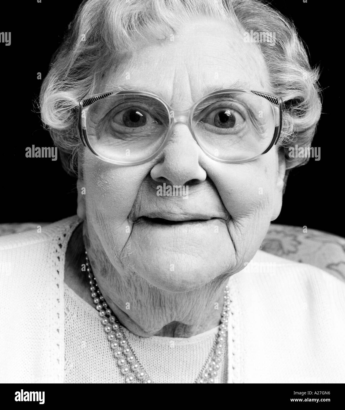 100 year old woman, happy and wise Stock Photo