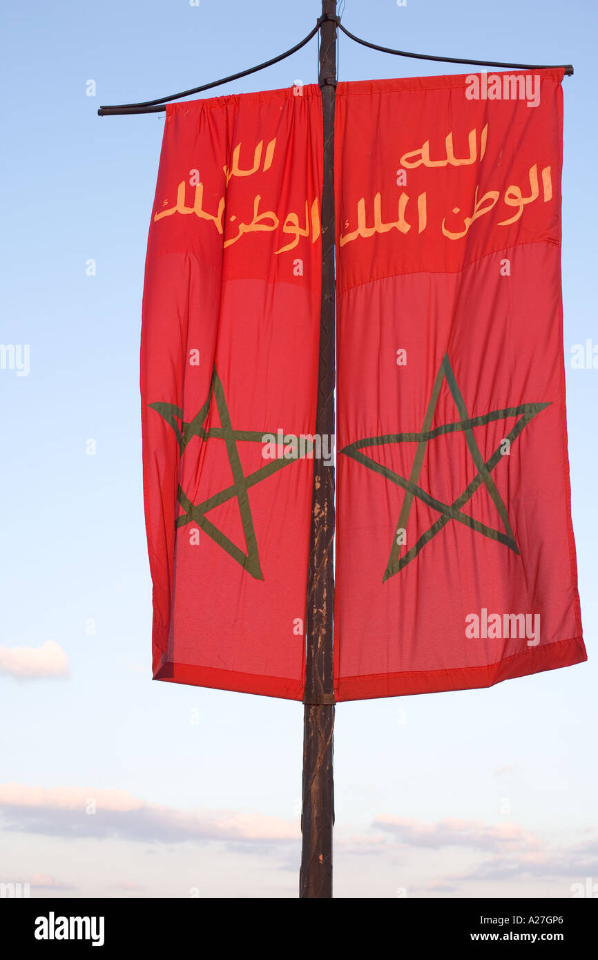 arabic flag near djemaa al fna and koutoubia mosque in marakesh morocco Stock Photo