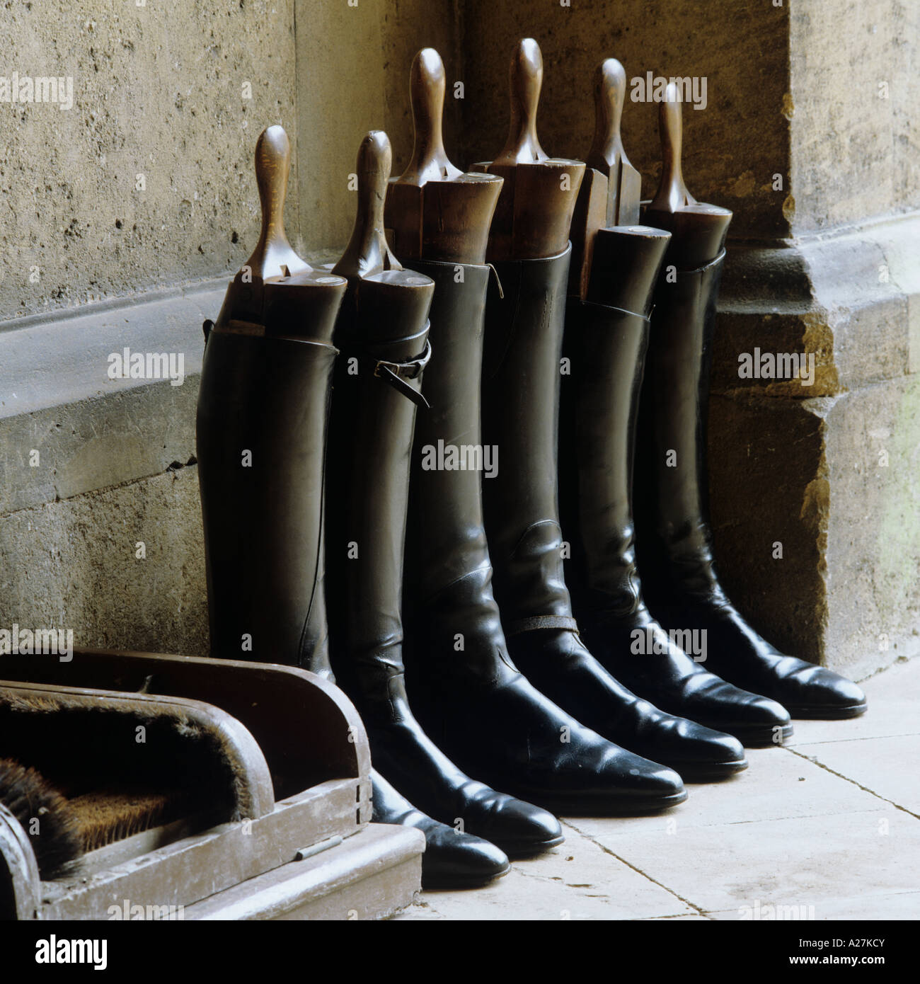 Three pairs of riding boots in a line Stock Photo