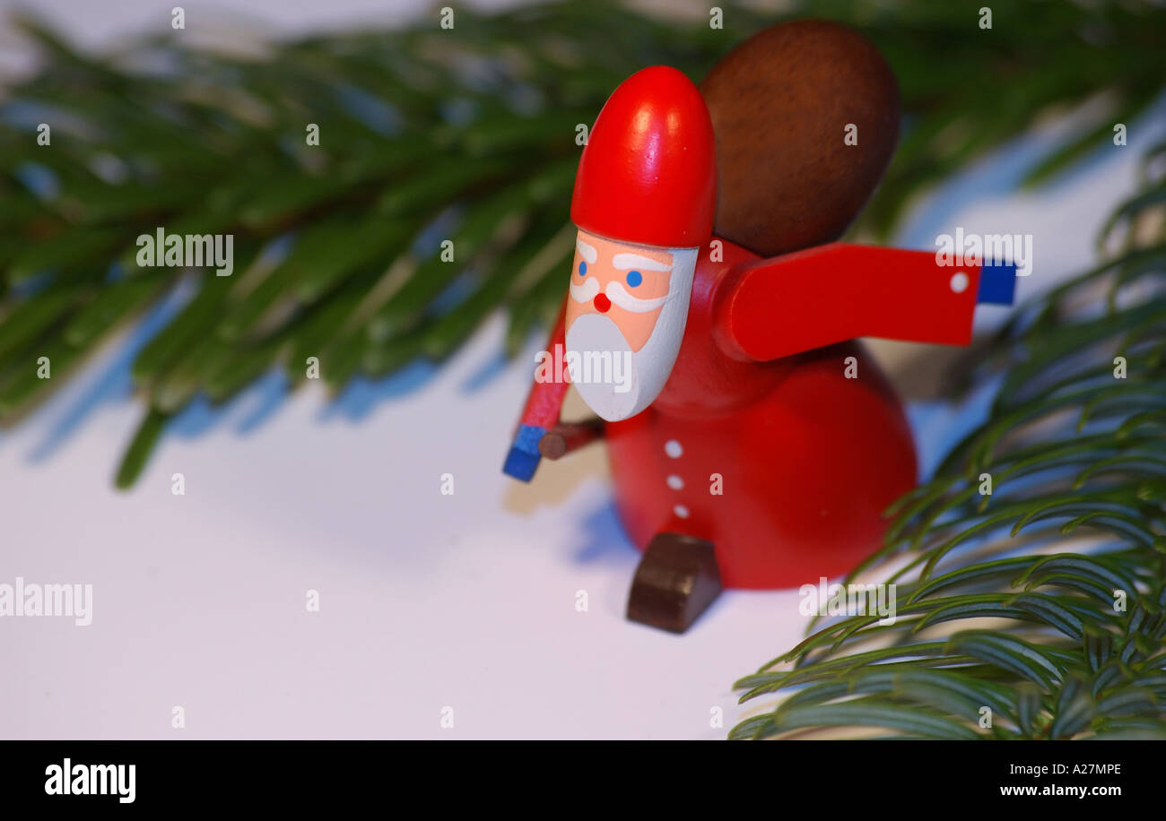 Wood-carved Santa Claus Christmas ornament Stock Photo