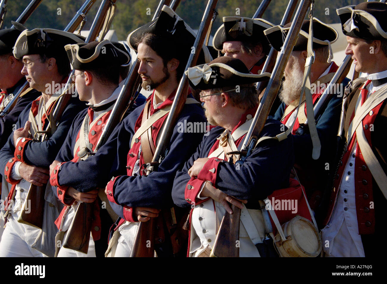 Continental Army soldiers reenact a march at Yorktown battlefield